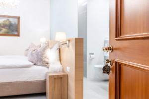 Voodi või voodid majutusasutuse Hotel Wolf toas