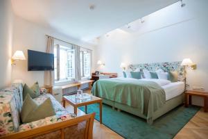 Voodi või voodid majutusasutuse Hotel Wolf toas