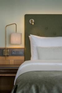 Posteľ alebo postele v izbe v ubytovaní Hotel IMLAUER & Bräu