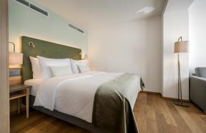 Posteľ alebo postele v izbe v ubytovaní Hotel IMLAUER & Bräu