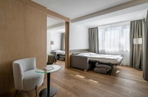 Posteľ alebo postele v izbe v ubytovaní Hotel IMLAUER & Bräu