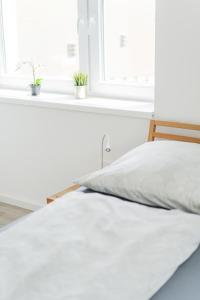 Ein Bett oder Betten in einem Zimmer der Unterkunft Schönbrunn (07): 3-Personen Wohnung nahe Gloriette