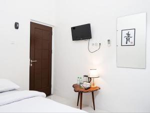 Postel nebo postele na pokoji v ubytování Padekostay