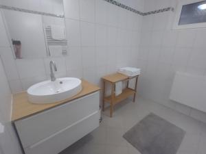 Kopalnica v nastanitvi Seeblick-Appartements Ossiach