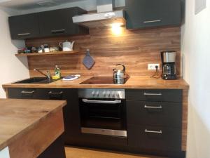 Kuhinja oz. manjša kuhinja v nastanitvi Seeblick-Appartements Ossiach