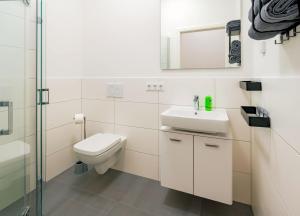 Phòng tắm tại City4Living Boardinghaus Bad Nauheim +7 ảnh