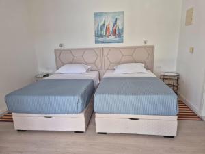Postel nebo postele na pokoji v ubytování Villa Azzurro with Private Beach