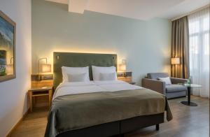 Posteľ alebo postele v izbe v ubytovaní Hotel IMLAUER & Bräu
