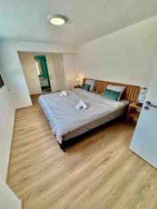 Ένα ή περισσότερα κρεβάτια σε δωμάτιο στο Luxury Maisonette with Terrace
