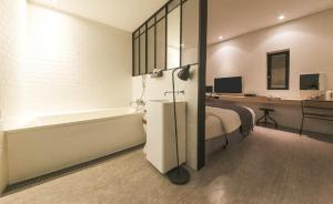 Ami Boutique Hotel, Yongin房間的床
