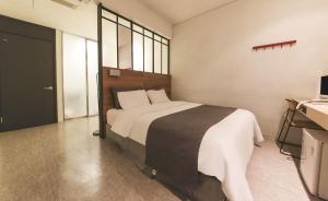 Ami Boutique Hotel, Yongin房間的床