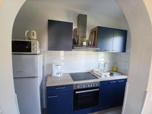 Kuchyňa alebo kuchynka v ubytovaní Apartments Kampor (4235)