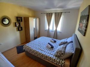 Posteľ alebo postele v izbe v ubytovaní Apartments Kampor (4235)