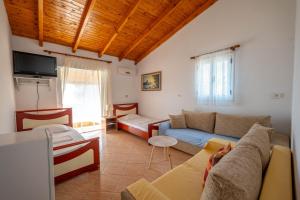TV a/nebo společenská místnost v ubytování Hotel Portokali