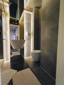 Koupelna v ubytování CosHOME - apartament + 37 fotografií