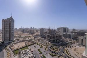 Nespecifikovaný výhled na destinaci Dubaj nebo výhled na město při pohledu z apartmánu