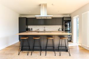 Η κουζίνα ή μικρή κουζίνα στο Iona 4 bed luxury in the heart of Bracklesham Bay