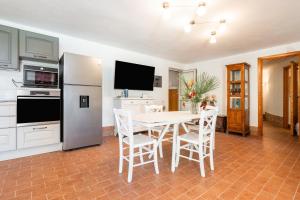 Kuchyň nebo kuchyňský kout v ubytování Harmònia Residence