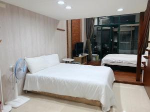 Letto o letti in una camera di 礁溪輕旅