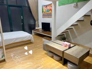 Letto o letti in una camera di 礁溪輕旅