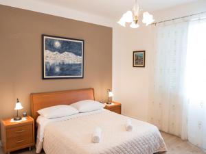 Posteľ alebo postele v izbe v ubytovaní Villa with with 5 apartments in Peracko Blato