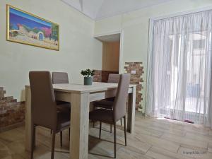 Posedenie v ubytovaní Dimora Genovesi