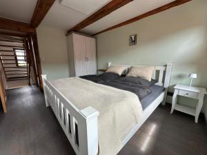 Postel nebo postele na pokoji v ubytování Ferienhaus "SCHMALE STUBE"