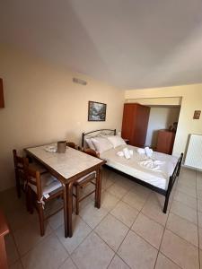 A bed or beds in a room at Studio Lakis Barbajonn's Stone House