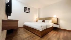 Posteľ alebo postele v izbe v ubytovaní A25 Hotel - 29 Lê Thị Hồng Gấm