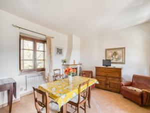 A television and/or entertainment centre at Lovely Apartment in Citerna with Swimming Pool