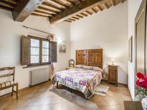 A bed or beds in a room at Lovely Apartment in Citerna with Swimming Pool