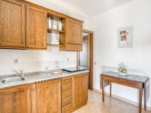 A kitchen or kitchenette at Lovely Apartment in Citerna with Swimming Pool