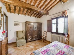 A bed or beds in a room at Lovely Apartment in Citerna with Swimming Pool