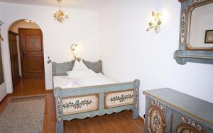 Postel nebo postele na pokoji v ubytování Wellnesshotel Mein Almhof Superior