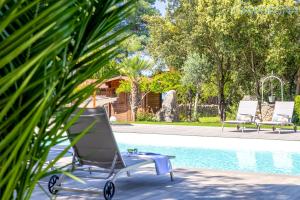 Gallery image of ClickSardegna Luxury Villa Elike with private pool with patio and barbecue area in Surigheddu