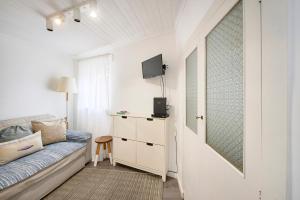 Μια τηλεόραση ή/και κέντρο ψυχαγωγίας στο Casa com Alma Portuguesa @ Alfama