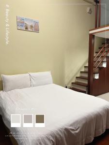 Letto o letti in una camera di 礁溪輕旅