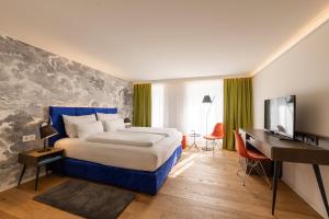 Posteľ alebo postele v izbe v ubytovaní Hotel Stein - Adults Only