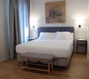 Postel nebo postele na pokoji v ubytování Posada San Ginés - Boutique rooms