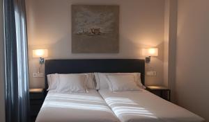 Postel nebo postele na pokoji v ubytování Posada San Ginés - Boutique rooms