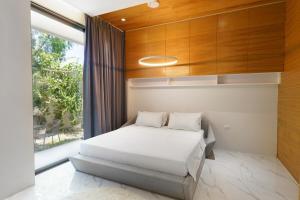 Postel nebo postele na pokoji v ubytování Luxury Villa Residence near Laguna + 33 fotografií