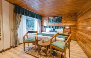 TV a/nebo společenská místnost v ubytování Mount Lungta Boutique Hotel & Spa