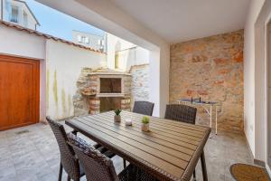 Et tv og/eller underholdning på CENTER house with apartments