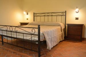 Giường trong phòng chung tại Agriturismo Dei Setteventi