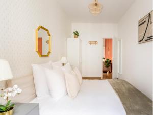 Posteľ alebo postele v izbe v ubytovaní Cozy Apartment - Opera - Caumartin I