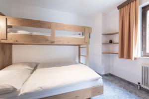 Postel nebo postele na pokoji v ubytování Haus Gariella