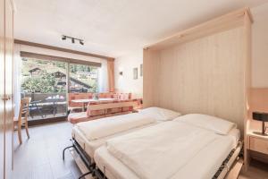 Postel nebo postele na pokoji v ubytování Haus Gariella