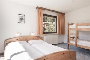 Postel nebo postele na pokoji v ubytování Haus Gariella