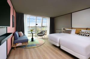 Avani Museum Quarter Amsterdam Hotel - previously NH Amsterdam Museum Quarter客房内的一张或多张床位
