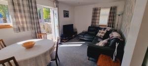 Et opholdsområde på The Shelter Stone Cottage + 36 billeder